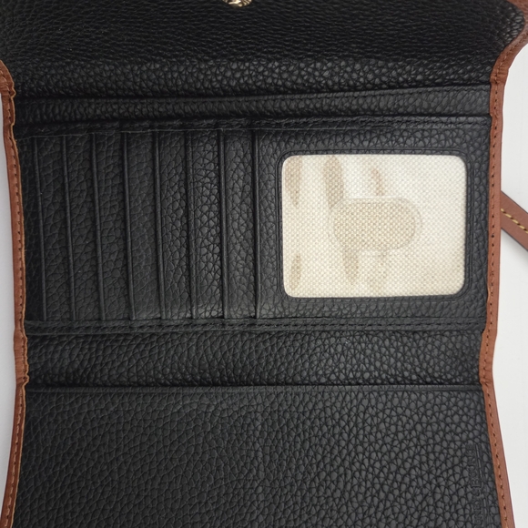 Dooney & Bourke Pebble Leather Clutch